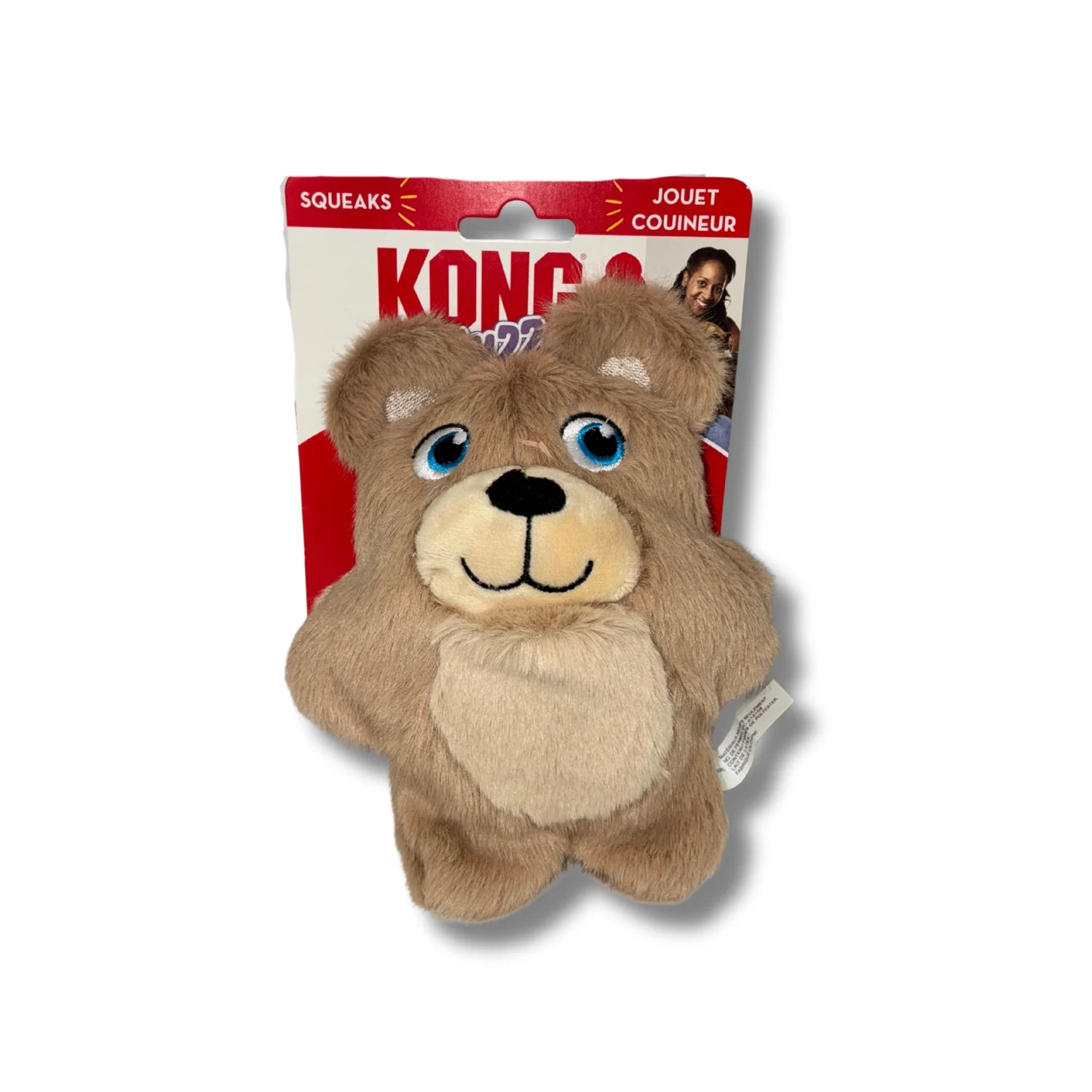 Brown teddy bear toy with blue eyes and a black nose, packaged in a red and white Kong toy box on a white background.