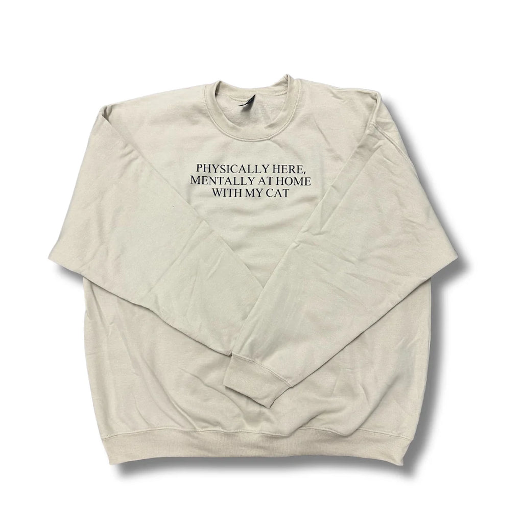 Beige sweatshirt with text on a white background